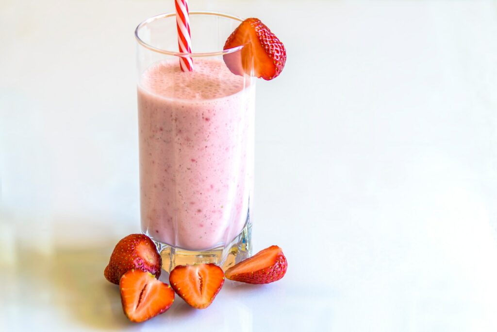 A protein shake with strawberries.